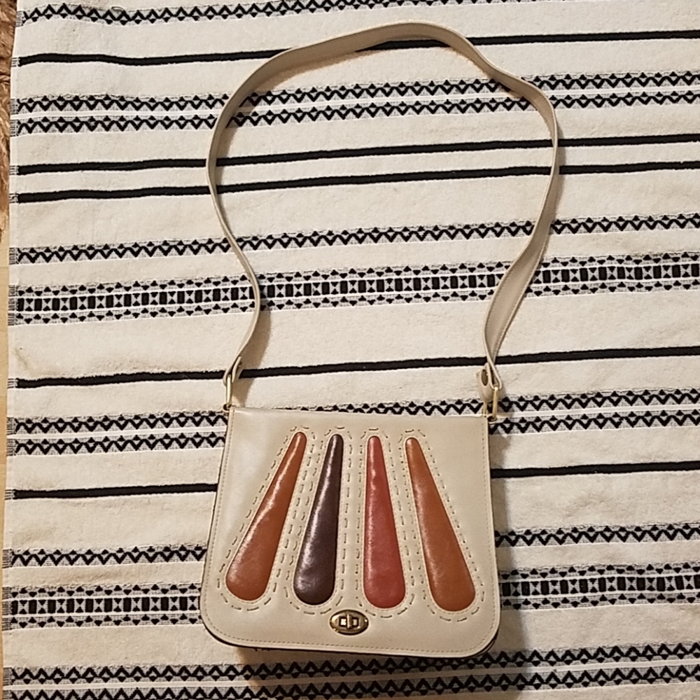 Tan purse with orange accents